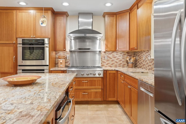 2657 Coralberry Pl, Charlottesville, VA 22911 - kitchen featuring stainless steel appliances, decorative backsplash, light tile patterned floors, light stone countertops, and recessed lighting