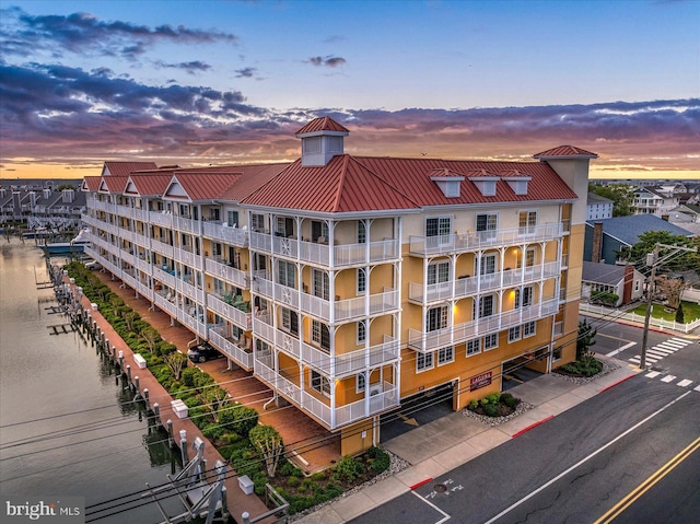 301 14th St Unit 308/309, Ocean City, MD 21842 - property at dusk featuring a view of apartment building / complex