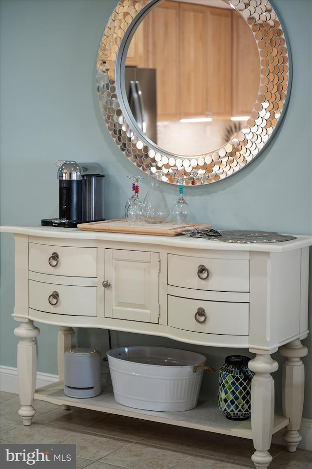301 14th St Unit 308/309, Ocean City, MD 21842 - bathroom with vanity, tile patterned floors, and baseboards
