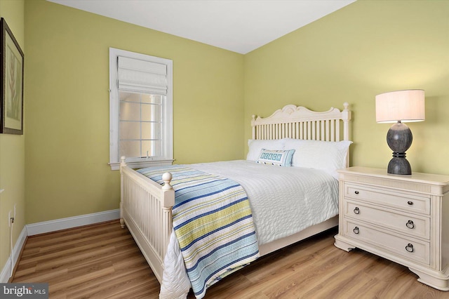 301 14th St Unit 308/309, Ocean City, MD 21842 - bedroom featuring light wood-style floors and baseboards