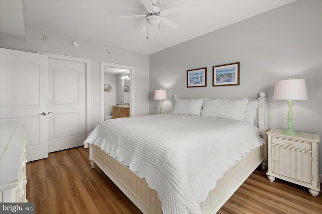 301 14th St Unit 308/309, Ocean City, MD 21842 - bedroom with wood finished floors, ensuite bath, and a ceiling fan