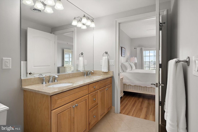 301 14th St Unit 308/309, Ocean City, MD 21842 - ensuite bathroom with tile patterned flooring, healthy amount of natural light, and double vanity