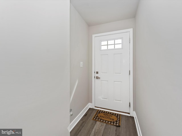 14716 Spring Haven Ln, Laurel, MD 20707 - doorway to outside featuring dark wood-style floors and baseboards