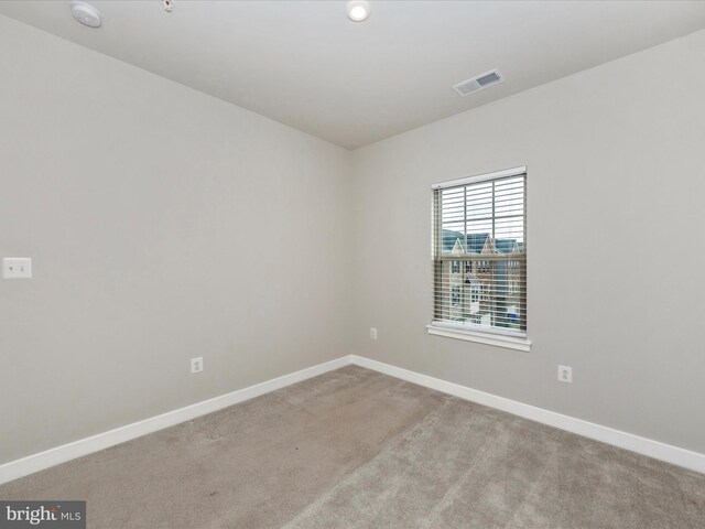 14716 Spring Haven Ln, Laurel, MD 20707 - spare room with baseboards, a smoke detector, and carpet floors
