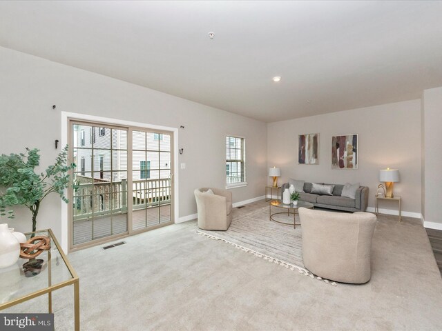 14716 Spring Haven Ln, Laurel, MD 20707 - living room featuring baseboards and carpet floors