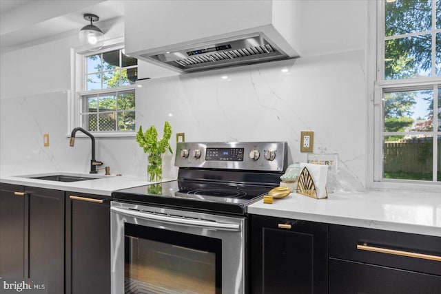 1745 Remington Dr, Crofton, MD 21114 - kitchen featuring stainless steel electric stove, custom range hood, dark cabinets, a sink, and light countertops