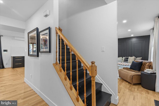 1745 Remington Dr, Crofton, MD 21114 - stairs with wood finished floors, recessed lighting, and baseboards