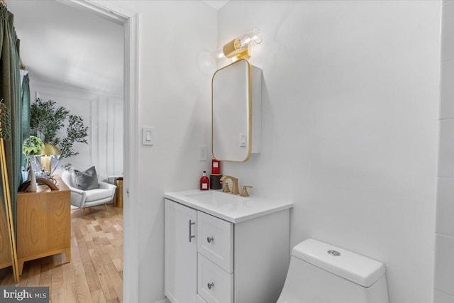 1745 Remington Dr, Crofton, MD 21114 - bathroom with wood finished floors, vanity, and toilet