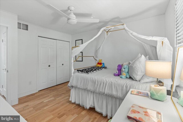 1745 Remington Dr, Crofton, MD 21114 - bedroom featuring light wood-type flooring, a closet, a ceiling fan, and baseboards