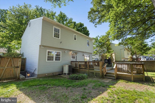 1745 Remington Dr, Crofton, MD 21114 - back of property featuring a fenced backyard and a wooden deck