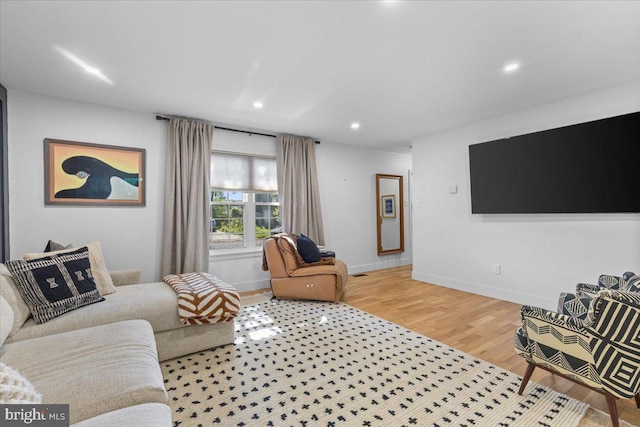 1745 Remington Dr, Crofton, MD 21114 - living room with light wood finished floors, baseboards, and recessed lighting