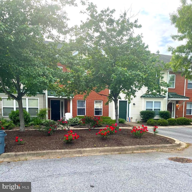 310 Hilltop Ln, Chestertown, MD 21620 - view of property hidden behind natural elements with brick siding