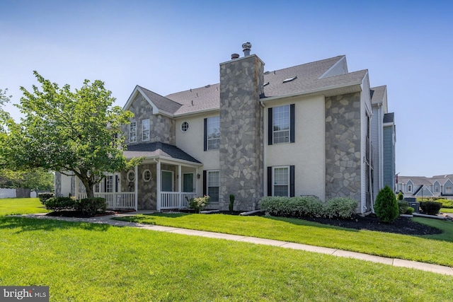 217 Pratt Ct, Sewell, NJ 08080 - view of front facade with stone siding, covered porch, a front lawn, and a chimney