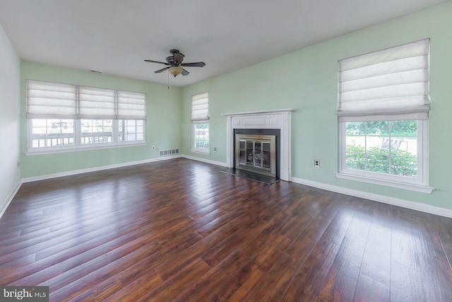 217 Pratt Ct, Sewell, NJ 08080 - unfurnished living room with a ceiling fan, dark wood-type flooring, and a fireplace with flush hearth