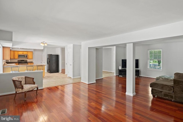 780 Cotswolde Quay Ct, Severna Park, MD 21146 - living area with light wood-style floors and baseboards
