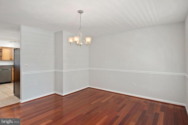 780 Cotswolde Quay Ct, Severna Park, MD 21146 - spare room with a chandelier, light wood-type flooring, and baseboards