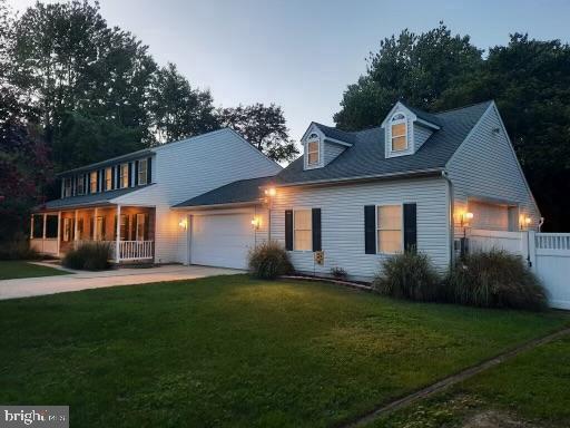 780 Cotswolde Quay Ct, Severna Park, MD 21146 - view of front of home with a porch, an attached garage, and driveway