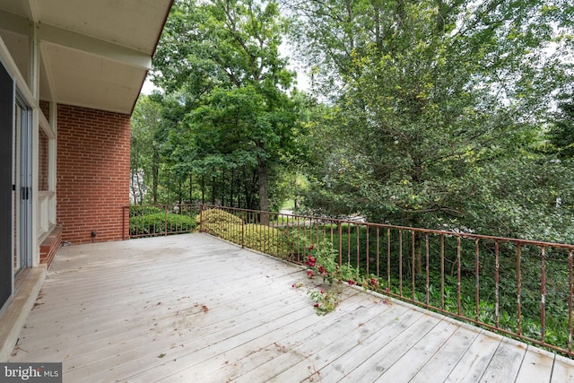 6802 Nesbitt Pl, Mclean, VA 22101 - wooden deck with view of wooded area
