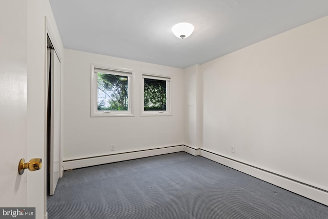 6802 Nesbitt Pl, Mclean, VA 22101 - unfurnished bedroom with carpet floors, a baseboard heating unit, a closet, and baseboards