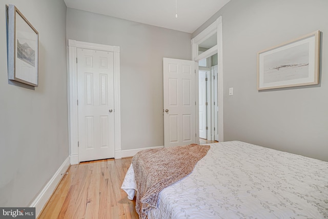 1823 4th St NW, Washington, DC 20001 - bedroom with light wood-style flooring and baseboards