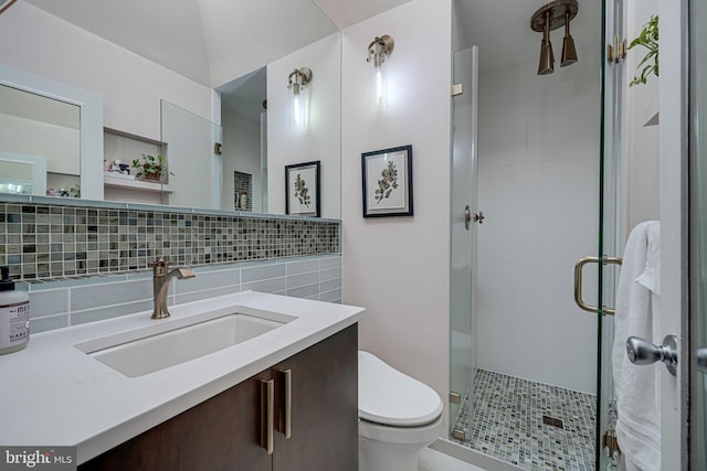 1823 4th St NW, Washington, DC 20001 - bathroom featuring toilet, vanity, backsplash, and a stall shower