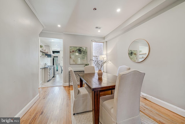 1823 4th St NW, Washington, DC 20001 - dining space with light wood-style flooring, crown molding, baseboards, and recessed lighting