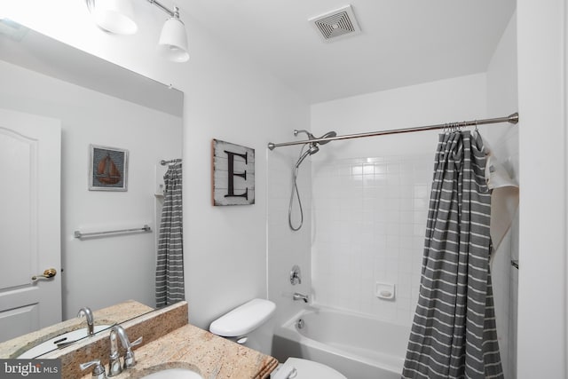 full bathroom featuring toilet, vanity, and shower / bathtub combination with curtain
