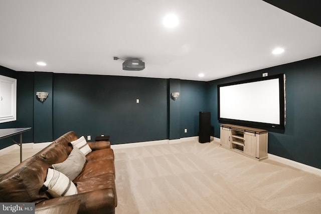 cinema with light carpet, baseboards, and recessed lighting