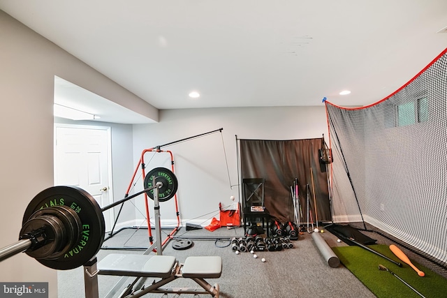 exercise room with recessed lighting, baseboards, and carpet flooring