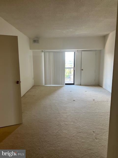 200 N Pickett St Unit 1614, Alexandria, VA 22304 - unfurnished room featuring carpet flooring and a textured ceiling