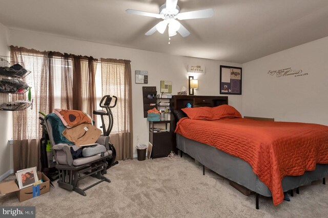 bedroom featuring carpet floors and a ceiling fan