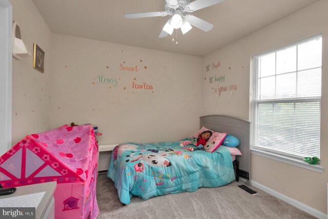 bedroom featuring carpet flooring, baseboards, and ceiling fan