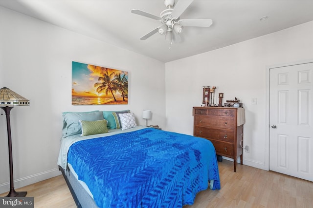 2429 S Reese St, Philadelphia, PA 19148 - bedroom with wood finished floors, baseboards, and a ceiling fan