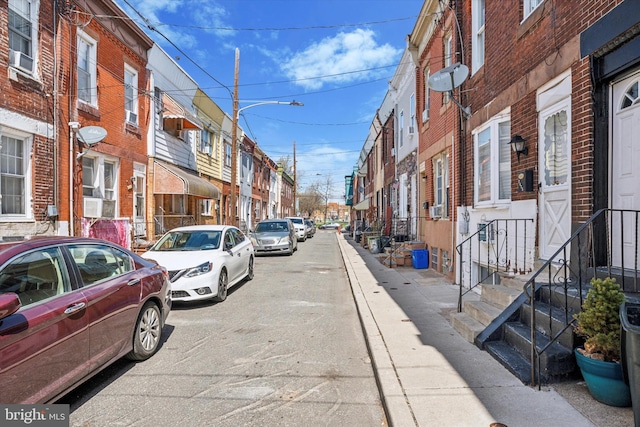 2429 S Reese St, Philadelphia, PA 19148 - view of asphalt road with sidewalks, street lighting, curbs, and a residential view