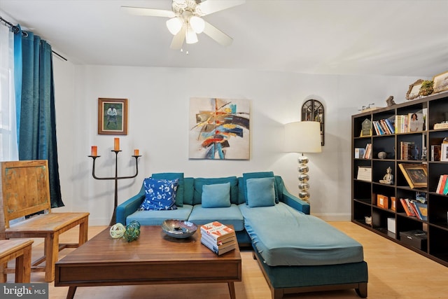 2429 S Reese St, Philadelphia, PA 19148 - living area with ceiling fan, baseboards, and wood finished floors