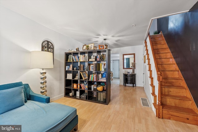 2429 S Reese St, Philadelphia, PA 19148 - sitting room with wood finished floors, stairs, and baseboards