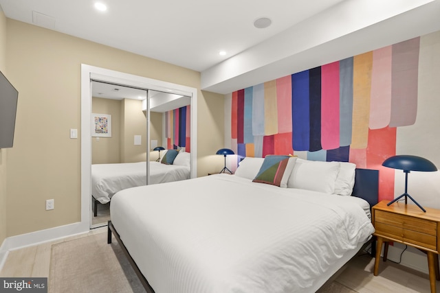 919 French St NW, Washington, DC 20001 - bedroom featuring a closet, recessed lighting, baseboards, and wood finished floors