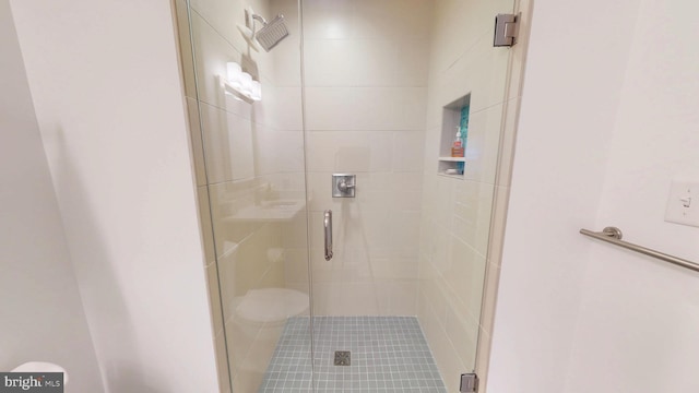 306 S Exeter St, Baltimore, MD 21202 - full bath with a shower stall and toilet