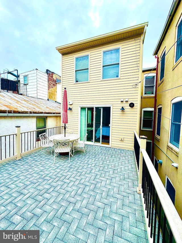 306 S Exeter St, Baltimore, MD 21202 - back of house featuring outdoor dining space
