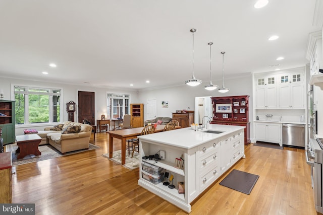 2277 Indian Holw, Winchester, VA 22603 - kitchen featuring dishwasher, a sink, recessed lighting, ornamental molding, and white cabinets