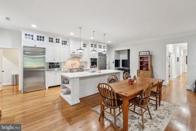 2277 Indian Holw, Winchester, VA 22603 - dining room with recessed lighting, light wood-style floors, crown molding, and baseboards