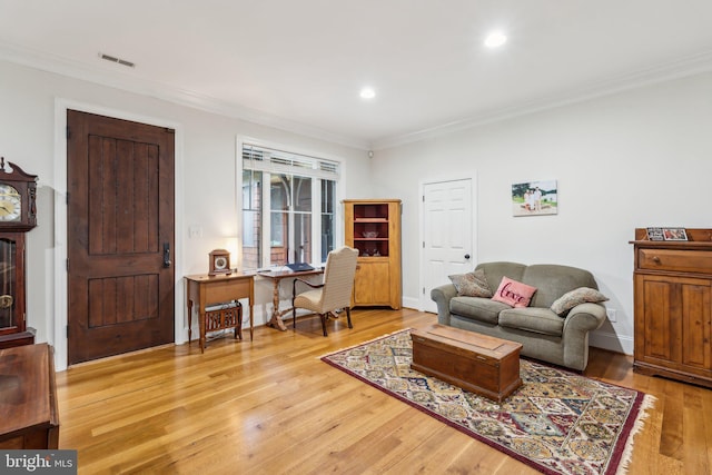 2277 Indian Holw, Winchester, VA 22603 - living area featuring ornamental molding, wood finished floors, recessed lighting, and baseboards