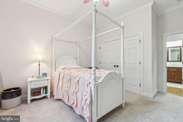 2277 Indian Holw, Winchester, VA 22603 - bedroom with light colored carpet, crown molding, baseboards, a closet, and connected bathroom