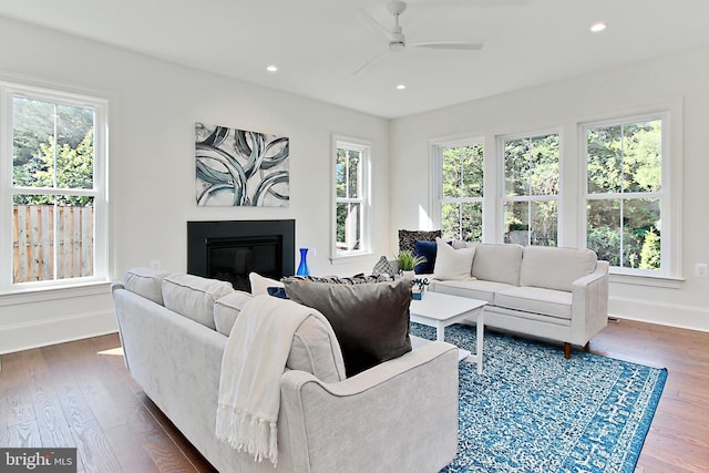 7430 Foundation Way, Springfield, VA 22150 - living area with ceiling fan, dark wood-style floors, a glass covered fireplace, and recessed lighting