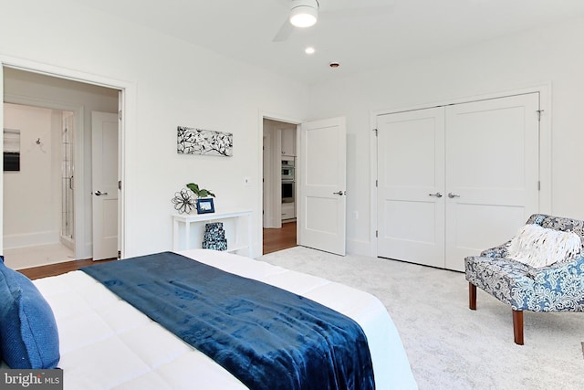 7430 Foundation Way, Springfield, VA 22150 - bedroom featuring a closet, a ceiling fan, and light colored carpet
