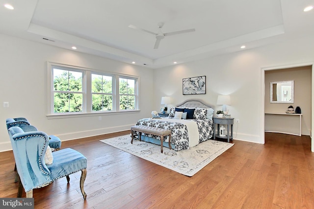 7430 Foundation Way, Springfield, VA 22150 - bedroom with a raised ceiling, recessed lighting, wood finished floors, and a ceiling fan