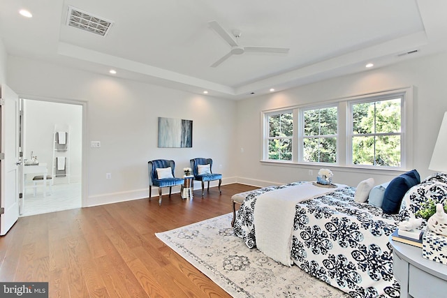 7430 Foundation Way, Springfield, VA 22150 - bedroom featuring a tray ceiling, recessed lighting, and wood finished floors