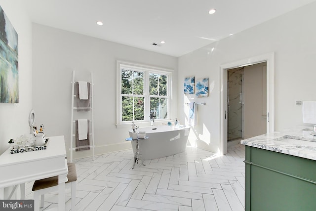 7430 Foundation Way, Springfield, VA 22150 - bathroom featuring a freestanding bath, recessed lighting, a marble finish shower, and vanity
