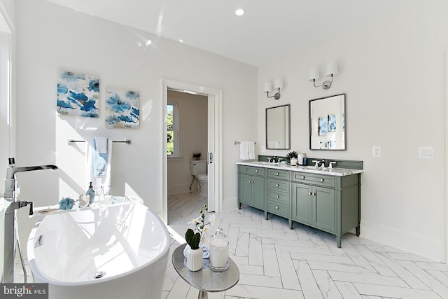 7430 Foundation Way, Springfield, VA 22150 - bathroom with double vanity, a freestanding tub, and recessed lighting