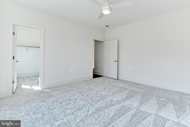 7430 Foundation Way, Springfield, VA 22150 - unfurnished bedroom with carpet, a spacious closet, and a ceiling fan